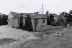 Datering onbekend. Houten huisjes op Wanroijseweg